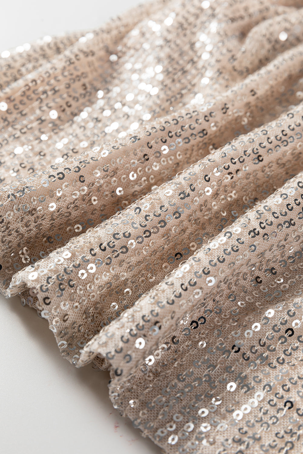 Jet Stream Sequin Mock Neck Drape Open Back Bell Sleeve Top