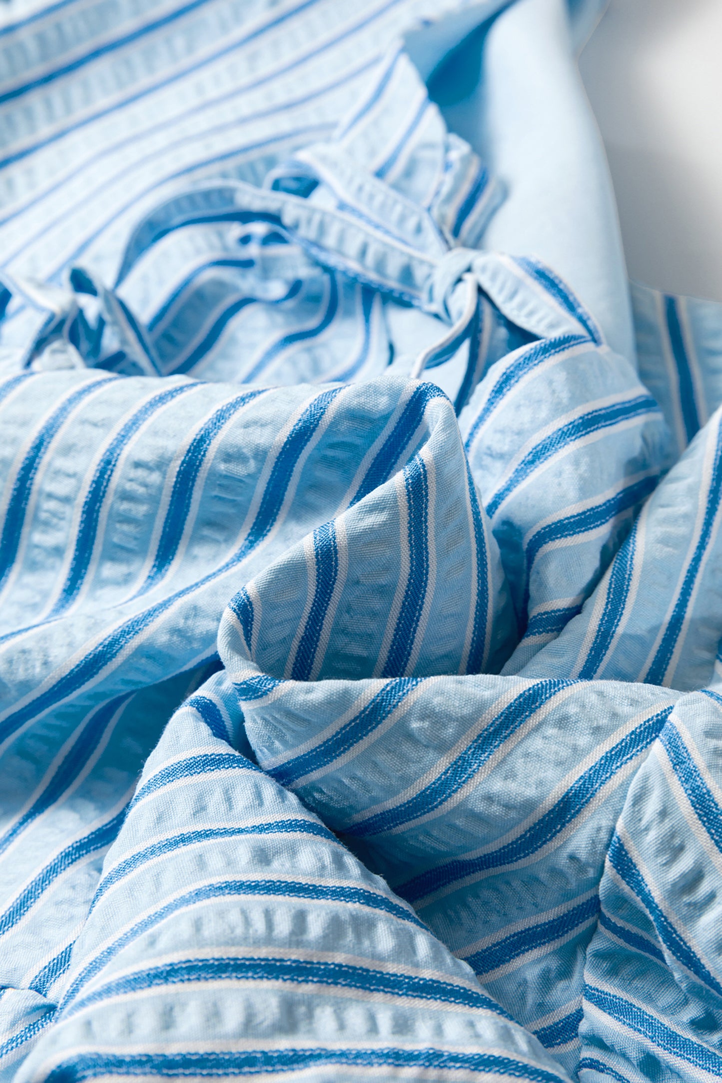 Sky Blue Stripe Bow Knot Textured Short Puff Sleeve Babydoll Blouse